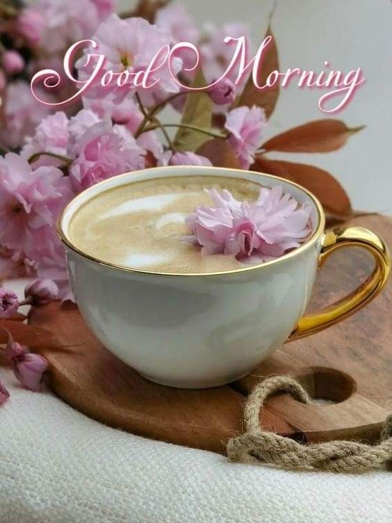 Cup of coffee with a flower
